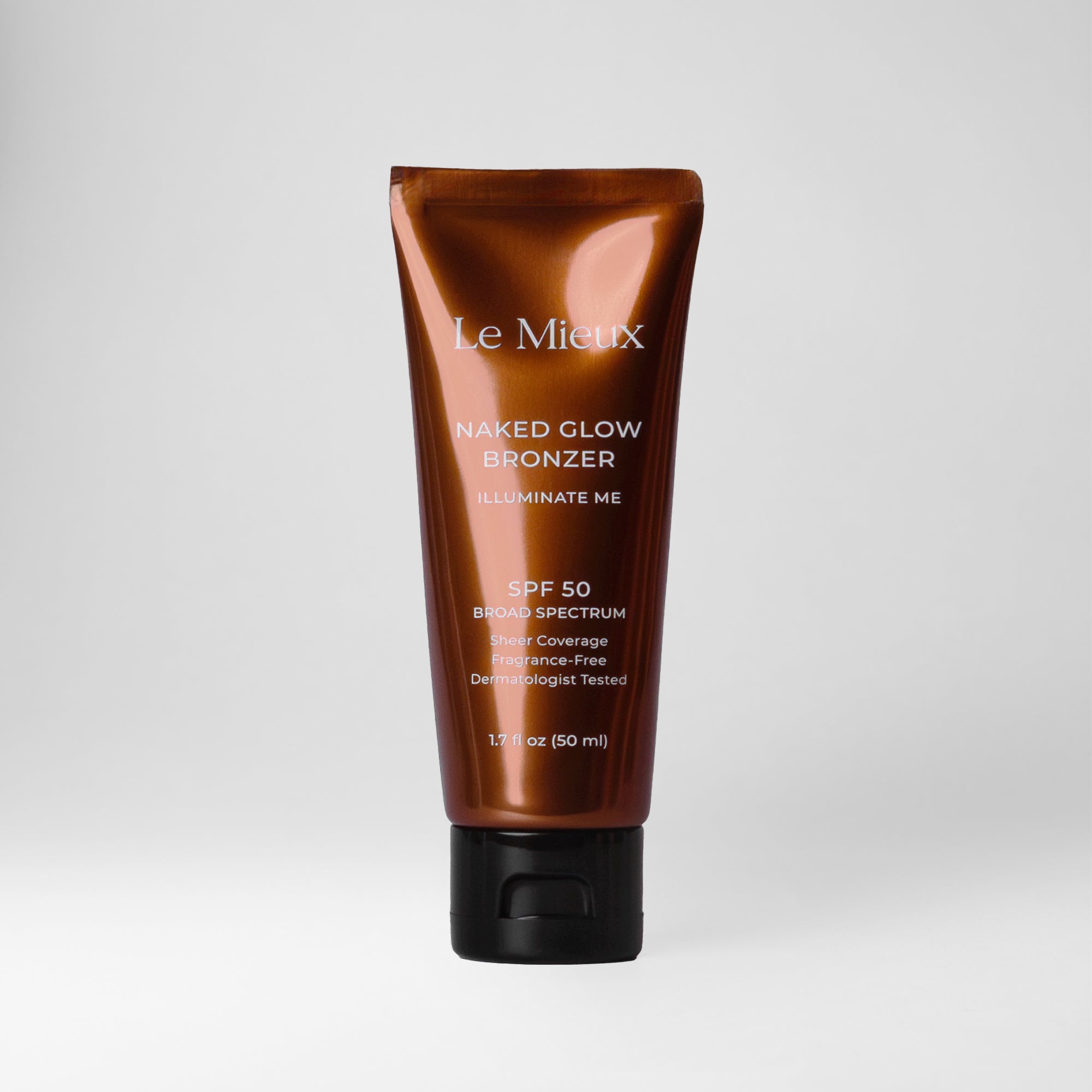 Naked Glow Bronzer isolated on a light grey background